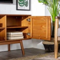 Solid Wood Mid-Century Modern TV Stand For TVs Up To 65" - Saracina Home -Furniture Outlet Store GUEST 4814f0a0 557a 4091 bf29 8479abd8c5d7